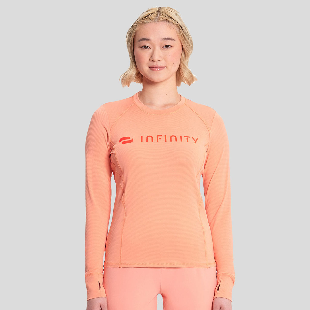 IN_INFINITY_GNR8_LOGOPERFORMANCEUNDERSCRUB_641_ELECTRICCORAL_FRONT