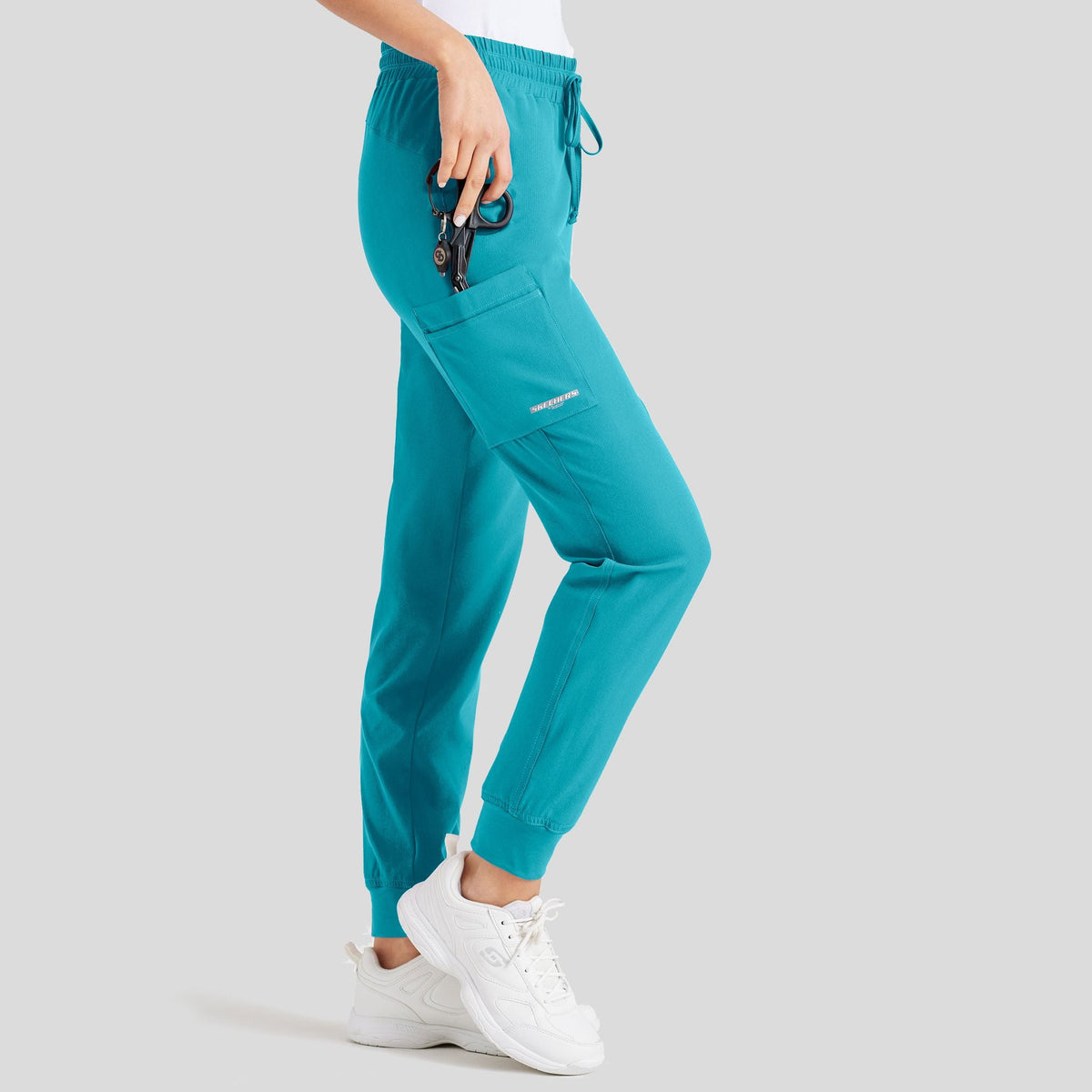 Sketchers_SKP552_Teal_right